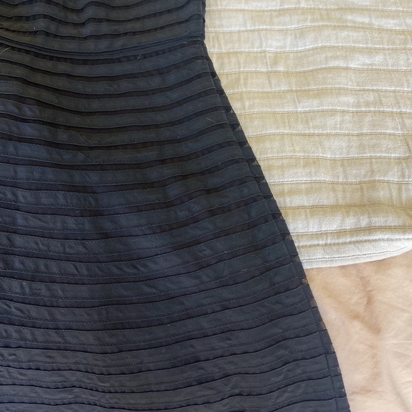 Black lined dress, side zipper, see through neck/ base skirt & skirt flares out - Picture 2 of 6